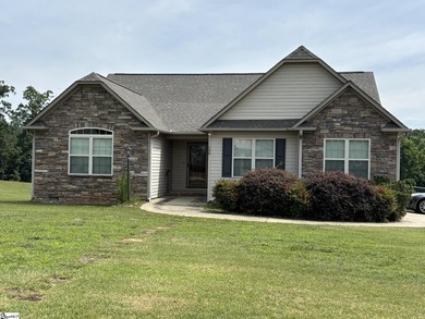 HANDICAP ACCESSIBLE! Welcome home to this beautifully maintained - photo 1