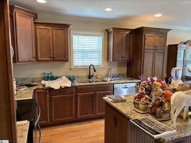HANDICAP ACCESSIBLE! Welcome home to this beautifully maintained - photo 4