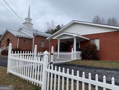 Two buildings zoned commercial currently an established church - photo 1