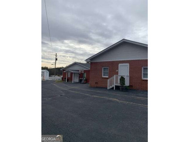 Two buildings zoned commercial currently an established church - photo 3