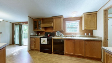Home with 3.2 acres near lake with 3 campsites. - photo 11