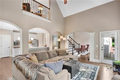 Elegant four-sided brick home with a luxurious primary suite on - photo 17