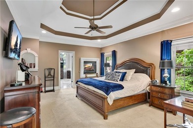 Elegant four-sided brick home with a luxurious primary suite on - photo 22