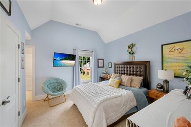Elegant four-sided brick home with a luxurious primary suite on - photo 35