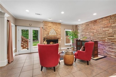Elegant four-sided brick home with a luxurious primary suite on - photo 38