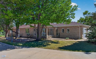 Brick ranch-style home on approximately 2 acres in Mead with - photo 37