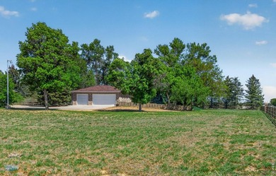 Brick ranch-style home on approximately 2 acres in Mead with - photo 38