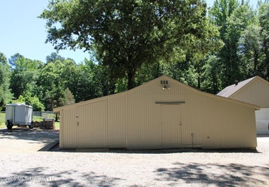 Lovely one-level home situated on a gated 4.8-acre lot in the - photo 33