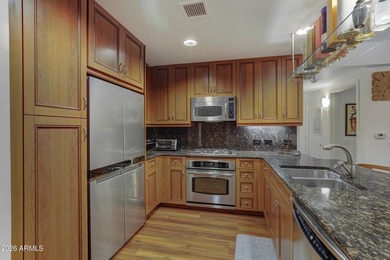 Perfectly positioned within the lush interior courtyard of the