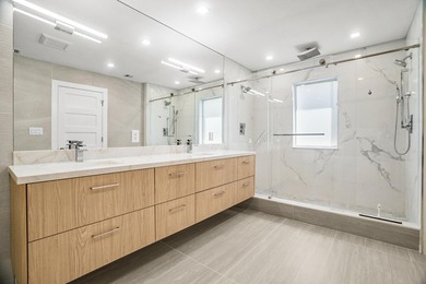 Presenting a COMPLETELY REMODELED 4-bedroom, 4-bath family home - photo 33