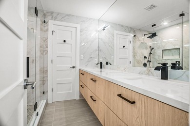 Presenting a COMPLETELY REMODELED 4-bedroom, 4-bath family home - photo 38