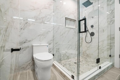 Presenting a COMPLETELY REMODELED 4-bedroom, 4-bath family home - photo 39