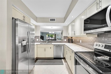 Lake Condo For Sale in Coconut Creek, Florida