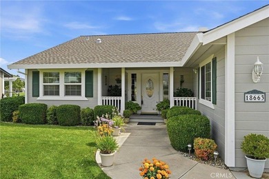 Meticulously maintained and beautifully landscaped, this - photo 5