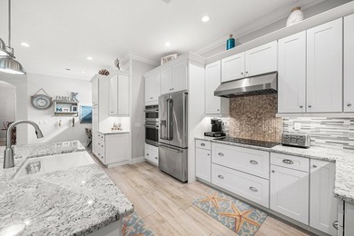 Experience elevated waterfront living in this totally remodeled - photo 11
