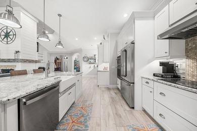 Experience elevated waterfront living in this totally remodeled - photo 12