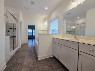 Like-new West-facing Ashton Woods home 4 bedrooms | 4 bathrooms - photo 16