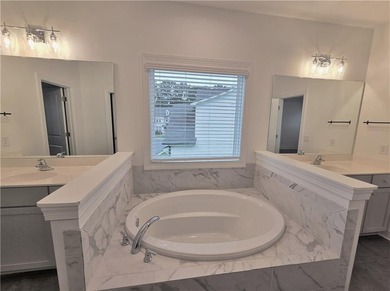 Like-new West-facing Ashton Woods home 4 bedrooms | 4 bathrooms - photo 17