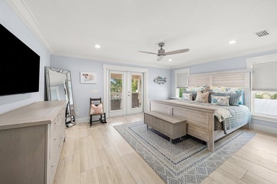 Experience elevated waterfront living in this totally remodeled - photo 25