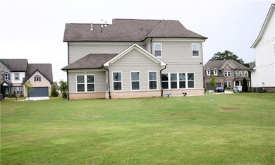 Like-new West-facing Ashton Woods home 4 bedrooms | 4 bathrooms - photo 31
