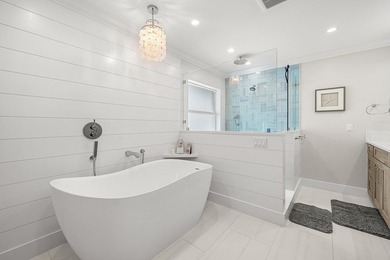 Experience elevated waterfront living in this totally remodeled - photo 32