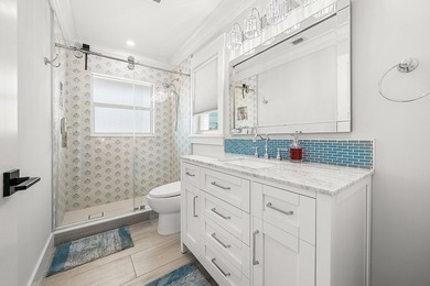 Experience elevated waterfront living in this totally remodeled - photo 36