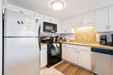 Beachfront living meets fresh coastal style in this updated - photo 11