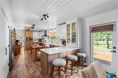 This stunning remodeled 3-bedroom, 3-bath home perfectly blends