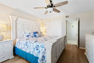 Beachfront living meets fresh coastal style in this updated - photo 18
