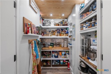 This stunning remodeled 3-bedroom, 3-bath home perfectly blends