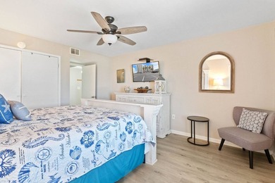 Beachfront living meets fresh coastal style in this updated - photo 19