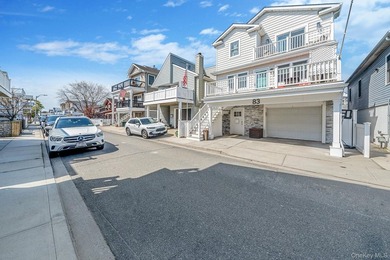 Just over one block from the beach, this fully renovated home - photo 2