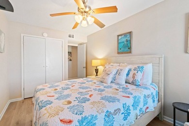 Beachfront living meets fresh coastal style in this updated - photo 23