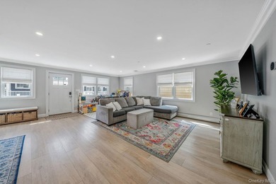 Just over one block from the beach, this fully renovated home - photo 6
