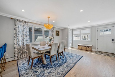 Just over one block from the beach, this fully renovated home - photo 7
