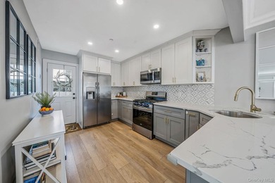 Just over one block from the beach, this fully renovated home - photo 9