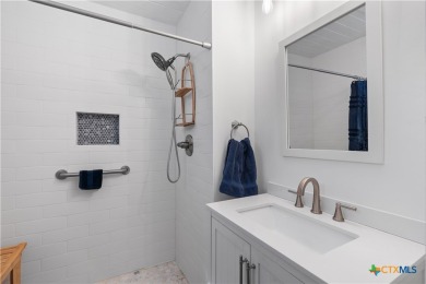 This stunning remodeled 3-bedroom, 3-bath home perfectly blends