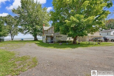 Rare opportunity to own an 8-unit lakefront property with an - photo 5