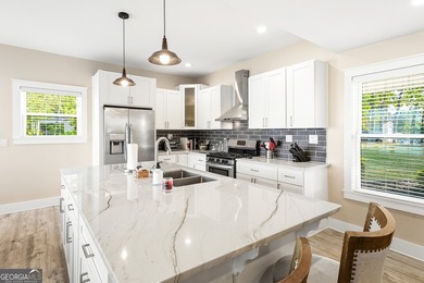 Completely reimagined and beautifully renovated, this Lake - photo 11