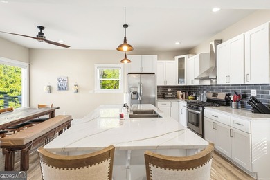 Completely reimagined and beautifully renovated, this Lake - photo 12