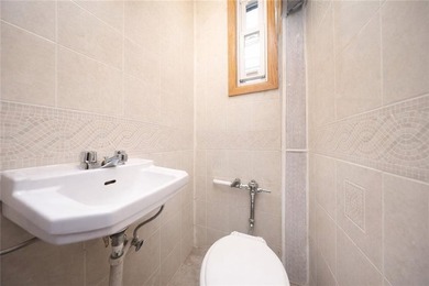 Welcome to 4388 Bedford Avenue, a beautifully maintained brick - photo 15