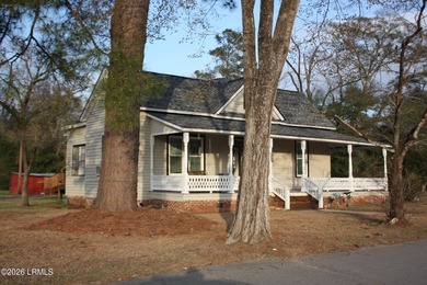 Old farmhouse style of the late 1800's with a wraparound porch