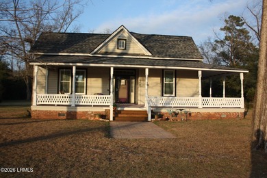 Old farmhouse style of the late 1800's with a wraparound porch