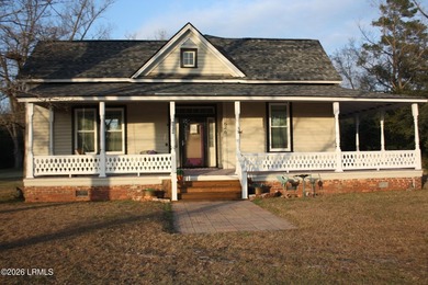 Old farmhouse style of the late 1800's with a wraparound porch