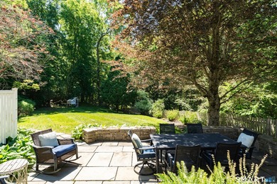 Beautifully sited on a fabulous private lot in the highly - photo 28