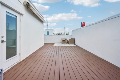 Rooftop sunsets, modern lines, and a lock-and-leave lifestyle - photo 31