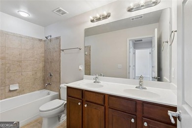 Two-story home featuring an open, light-filled floor plan with - photo 13