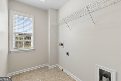 Two-story home featuring an open, light-filled floor plan with - photo 14