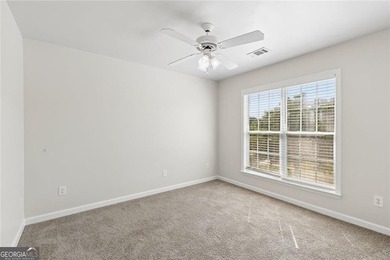 Two-story home featuring an open, light-filled floor plan with - photo 15