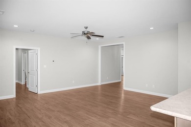 Welcome to Woodland Ridge! Built in 2022, this thoughtfully - photo 4